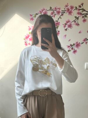 Sweater wit met bloem